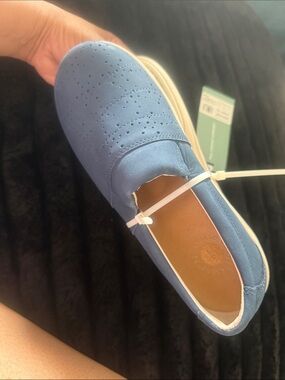 REVITALIGN Teal Tag with White Logo on Blue Shoe